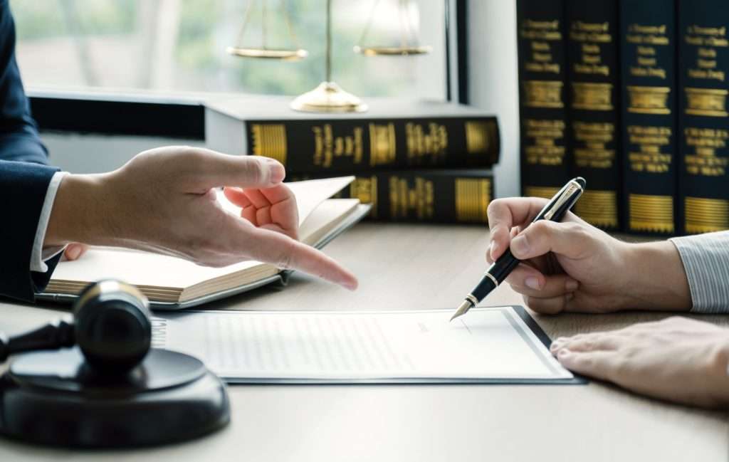 signing an agreement with the government