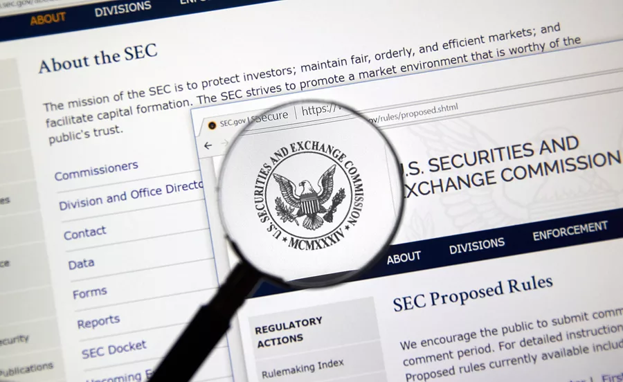 SEC webpage under magnifying glass to learn more about understanding SEC investigations.
